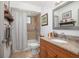 This charming bathroom features a shower with tile surround, and a vanity at 510 E Wisconsin Ave, Orange City, FL 32763