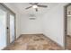 This vacant room features tile flooring, ceiling fan and lots of natural light at 510 E Wisconsin Ave, Orange City, FL 32763