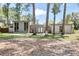 Charming single-story home featuring a modern design and lush landscaping at 510 E Wisconsin Ave, Orange City, FL 32763
