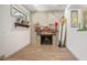 Cozy fireplace with shiplap details, surfboard, and charming decorative accents at 510 E Wisconsin Ave, Orange City, FL 32763
