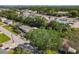Aerial view of house, surrounded by mature trees, showcasing the spacious neighborhood at 5400 Turton Ln, Port Orange, FL 32127