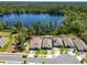 Beautiful aerial view of a single-Gathering home close to a lake in a well-maintained neighborhood at 6006 Mount Zion Cir, Deland, FL 32724