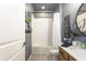 Neutral-toned bathroom featuring a shower-tub combo, floating single sink vanity, and tile flooring at 6006 Mount Zion Cir, Deland, FL 32724