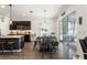 Open floor plan features a dining area next to sliding glass doors and a modern kitchen at 6006 Mount Zion Cir, Deland, FL 32724