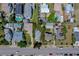 Aerial view of the property showcasing location in relation to neighboring homes and street access at 605 Goodall Ave, Daytona Beach, FL 32118