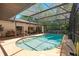 Relax by the pool with a screened enclosure, offering both sun and shade, plus an outdoor dining space at 639 Elwood St, Deltona, FL 32725