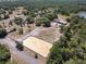 Aerial view of land including horse arena and other buildings and land at 685 Enterprise Osteen Rd, Osteen, FL 32764