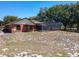 Spacious backyard featuring a screened pool and beautiful landscaping at 685 Enterprise Osteen Rd, Osteen, FL 32764