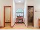 Bathroom featuring a vanity with a window, adjacent to a shower and toilet offering both convenience and privacy at 685 Enterprise Osteen Rd, Osteen, FL 32764