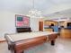 Game room featuring a pool table, piano, and stylish lighting at 685 Enterprise Osteen Rd, Osteen, FL 32764