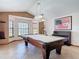 Game room featuring pool table, piano, and natural light at 685 Enterprise Osteen Rd, Osteen, FL 32764