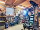 The interior of a garage features exercise equipment, a bike, and a workbench at 685 Enterprise Osteen Rd, Osteen, FL 32764