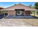 View of the horse stables featuring covered parking, and a well-kept exterior with sturdy construction at 685 Enterprise Osteen Rd, Osteen, FL 32764