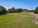 Expansive land with a mix of green space, mature trees, and outbuildings at 685 Enterprise Osteen Rd, Osteen, FL 32764