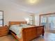 Comfortable main bedroom with access to the outdoors and plenty of natural light at 685 Enterprise Osteen Rd, Osteen, FL 32764