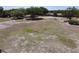 Expansive lot showcasing a house and guest house surrounded by mature trees at 685 Enterprise Osteen Rd, Osteen, FL 32764