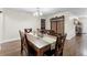 Cozy dining room with a rustic table setting, classic decor and charming accents at 732 Mockingbird Ln, Deland, FL 32720