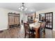 Inviting dining room featuring a dining table set and convenient entryway to kitchen and living areas at 732 Mockingbird Ln, Deland, FL 32720