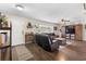 Comfortable living room with modern furnishings, hardwood floors, and a cozy ambiance at 732 Mockingbird Ln, Deland, FL 32720