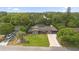 Features a well-maintained lawn, mature trees, and a convenient driveway at 795 Superior St, Deltona, FL 32725
