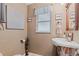 Bathroom featuring a vanity sink with decor and a window with natural light at 795 Superior St, Deltona, FL 32725