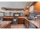 Well-designed kitchen with updated appliances and open layout to the living spaces at 795 Superior St, Deltona, FL 32725