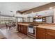 Stylish kitchen with stainless steel appliances and a seamless flow into the living area at 795 Superior St, Deltona, FL 32725