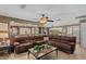 Comfortable living room with tile floors and an open view to the dining area at 795 Superior St, Deltona, FL 32725