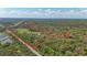 Expansive aerial view of land boundaries surrounded by lush green trees at 800 Hidden Oaks Ln, Oak Hill, FL 32759