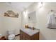 Bathroom featuring a vanity with granite countertops and tile floors at 800 Hidden Oaks Ln, Oak Hill, FL 32759