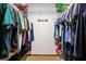 Walk-in closet features shelving, hanging rods, and ample space for storage at 808 Jutland St, Deltona, FL 32725