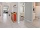 Hallway with views of a bedroom and bathroom, offering a glimpse into the home's layout and amenities at 811 Grand Park Ct, Deland, FL 32724