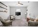 Cozy living room with comfortable seating and a large flat screen television at 811 Grand Park Ct, Deland, FL 32724