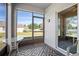 The covered lanai offers serene views of the backyard at 811 Grand Park Ct, Deland, FL 32724