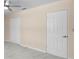 Bedroom with neutral paint, double door closet, and ceiling fan at 825 Baltimore Dr, Orlando, FL 32810