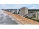Beachfront view of the ocean featuring multiple condos and other buildings at 89 S Atlantic Ave # 505, Ormond Beach, FL 32176