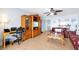 Comfortable living room featuring a workspace, entertainment center, and stylish decor at 89 S Atlantic Ave # 505, Ormond Beach, FL 32176