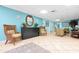 Stylish lobby area featuring comfortable wicker seating and a beautiful tiled floor at 89 S Atlantic Ave # 505, Ormond Beach, FL 32176