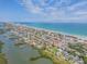 An aerial view of the home near the ocean and the inter-coastal waterway at 101 Egret Ave, Port Orange, FL 32127