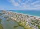 A coastal neighborhood aerial view showing proximity to the beach, ocean, and intercoastal waterway at 101 Egret Ave, Port Orange, FL 32127