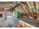 Attic space featuring exposed beams, offering potential for a unique living area at 101 Egret Ave, Port Orange, FL 32127