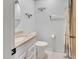 Bathroom with a neutral-colored vanity, toilet, and shower curtain at 101 Grand Plaza Dr # A30, Orange City, FL 32763