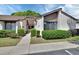 Charming condo featuring well-maintained landscaping and a welcoming entryway at 101 Grand Plaza Dr # A30, Orange City, FL 32763
