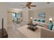 Bright living room showcasing dining area and stylish furnishings with a ceiling fan at 101 Grand Plaza Dr # A30, Orange City, FL 32763
