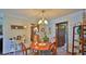 Warm dining room featuring wood table and chairs at 104 Nathan Hale Ct, Daytona Beach, FL 32119