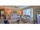 Comfortable living room featuring a bay window and plush seating at 104 Nathan Hale Ct, Daytona Beach, FL 32119