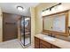 This bathroom boasts a stand up shower with an upgraded granite countertop at 105 Golfside Cir, Sanford, FL 32773