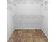 This walk in closet has built in metal shelving and tile floors at 105 Golfside Cir, Sanford, FL 32773