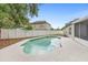 Clear view of backyard pool, partially surrounded by white privacy fence at 105 Golfside Cir, Sanford, FL 32773