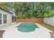An inviting pool is surrounded by lush foliage and offers a private and serene outdoor retreat at 105 Golfside Cir, Sanford, FL 32773